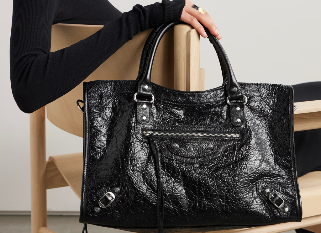  A chic vegan leather tote bag from the 2024 collection, offering a fashionable and sustainable choice with a minimalist design, perfect for the environmentally conscious fashionista.